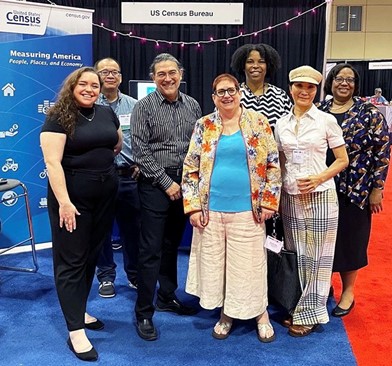 Staffing the Census Bureau booth at the Joint Statistical Meetings in Toronto.